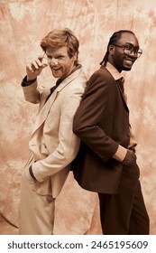 Two handsome multicultural men with elegant dapper style posing together.