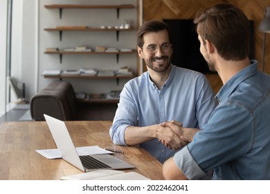 Two Happy Confident Businessmen Shaking Hands At Workplace. Business Leader, Employer Hiring And Welcoming Candidate After Job Interview. Customer And Broker Finishing Up Meeting, Expressing Respect