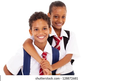 Two Happy Elementary School Friends On White