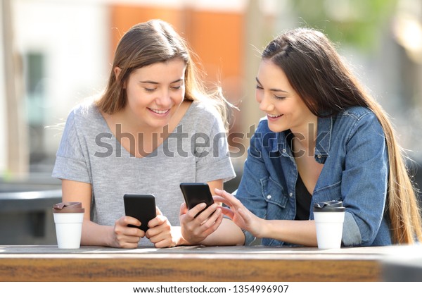 Two Happy Friends Comparing Their Smart Stock Photo 1354996907 ...