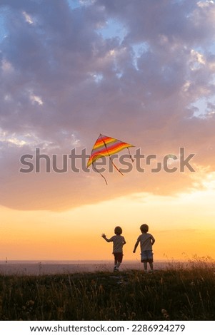 Similar – Vater und Sohn spielen im Park