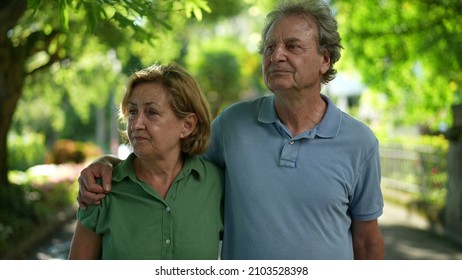 Two Happy Older People Walking Outside Smiling, Senior Couple Together In Outdoor Nature Walk