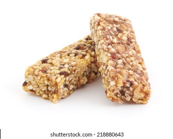 Two healthy cereal bars with fruits on white background