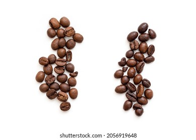 Two heaps of coffee grain Robusta and Arabica. Top view of roasted cofee beans robusta or Coffea Canephora and Arabica