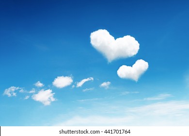 It Is Two Heart Clouds On Blue Sky.