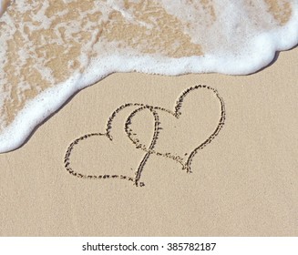 Two hearts in the sand          