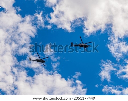 two helicopter rotorcraft. police helicopter. heli copter flight. helicopter adventure. helicopter flying in the sky