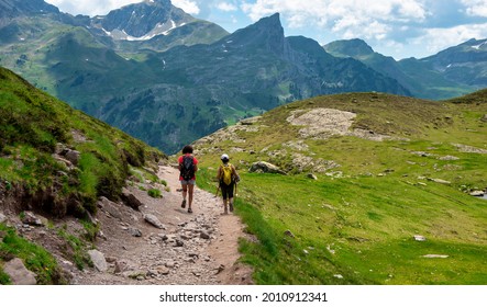 Two Hiker Women In Path Of Pic Du Midi Ossau In The French Pyrenees Mountains