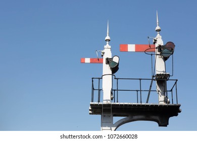 Two Historic Red Home British Railway Signals