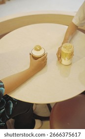Two iced coffees on the table