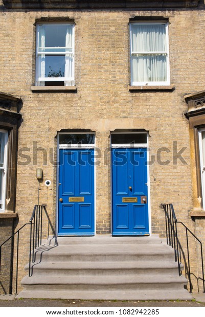 Two Identical Blue Wooden Front Doors Stock Photo Edit Now