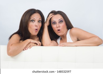 Two Impressed Woman With Open Eyes