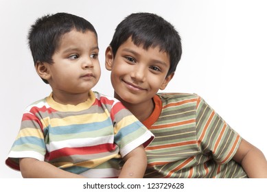 Two Indian Brothers Indoors Stock Photo (Edit Now) 123729628