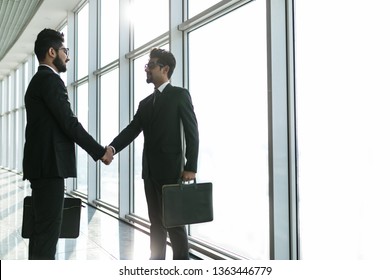 Two Indian Business Men Shaking Hands