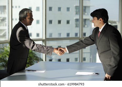 Two Indian Business Men Shaking Hands