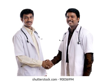 Two Indian Young Doctors Posing To The Camera.