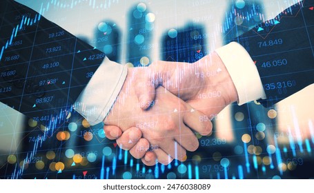 Two individuals shaking hands with a double exposure of financial charts, representing a business agreement with a creative overlay concept on a bokeh and numerical background - Powered by Shutterstock