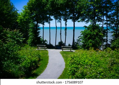 Two Isolated Benches At The Lake Erie Bluffs