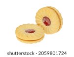 Two jam and cream biscuits isolated against white