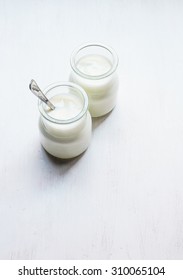 Two jars of yogurt