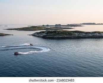 Two Jet Skis At The Skerry Coast Of Norway