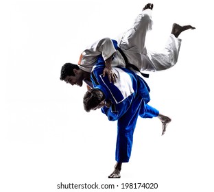 two judokas fighters fighting men in silhouette on white background