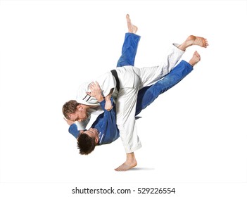 The Two Judokas Fighters Fighting Men On White Background