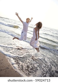 Two jumping at dawn