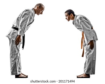 Two Karate Men Sensei And Teenager Student Fighters Fighting Isolated On White Background