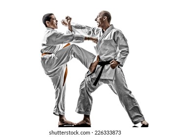 Two Karate Men Sensei And Teenager Student Fighters Fighting Isolated On White Background