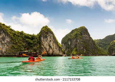 Two Kayaks Paddling In Halong Bay - Vietnam