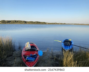 Two Kayaks At The Water's Edge