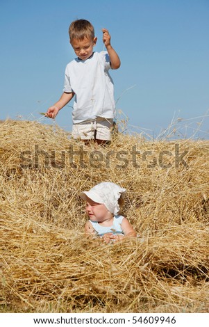 Similar – Vater und Sohn sitzen im Park.