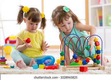 Two Kids Playing Wooden Blocks Their Stock Photo 1028965825 