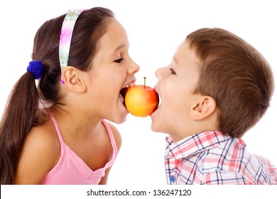 Two Kids Sharing The Apple, Isolated On White