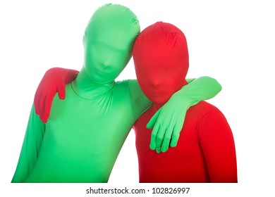 Two Kids Wearing Bright, Colorful Spandex Body Suits.  One Is Red, The Other Is Green.