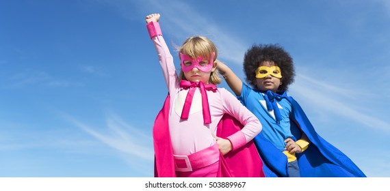 Two Kids Wearing Superhero With Sky Background