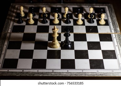 two kings chess board facing each other against a revolution from the pawns alliance