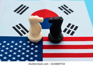 Two Knights Standing On American Flag And South Korean Flag.