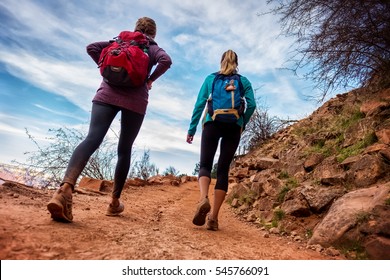 Two lady hiker on the walkway at the Grand Canyon National Park, USA