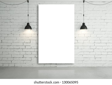 two lamps and blank poster on wall