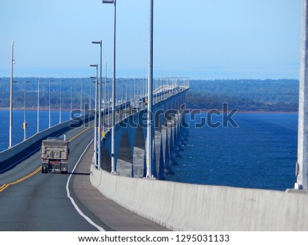 Two lane highway on the Confederation Bridge over the Northumberland Strait to Prince Edward Island, Canada. This bridge is the world's longest over ice covered waters.
					