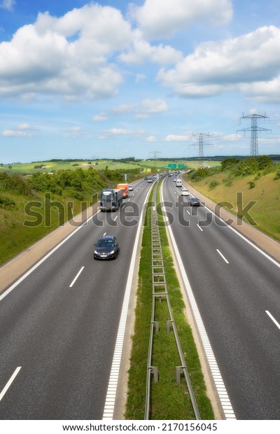 Two lane traffic. Traffic on a two lane highway\
in Denmark.