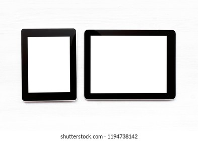 Two laptop computer with blank screen on the white office table background.