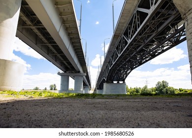 Two large bridges over the river. Bottom view of the bridge.