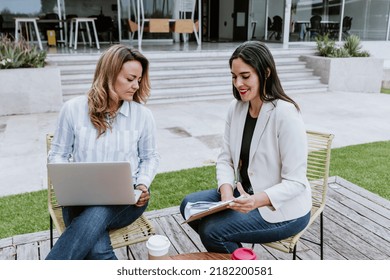 Two Latin Business Woman Middle Age Working With Computer At The Office In Mexico Latin America	