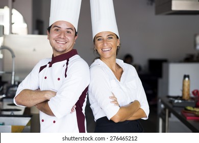 Two Latin Chefs In A Cooking School