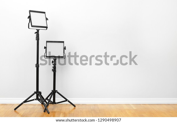 Two led\
lamps standing on the floor. Video\
light.