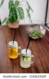 Two lemonade on table.