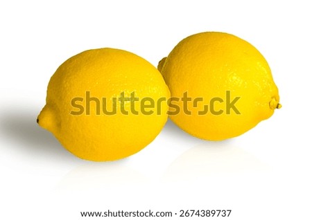 Two lemons on a white background